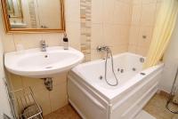 Bathroom with jacuzzi in the apartment of Hotel Panorama in the downtown of Eger Bathroom with jacuzzi in the apartment of Hotel Panorama in the downtown of Eger