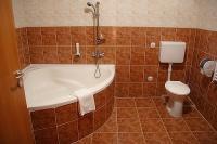 Bathroom with corner bath in Canada Hotel Budapest - cheap accomodation close to the M5 highway